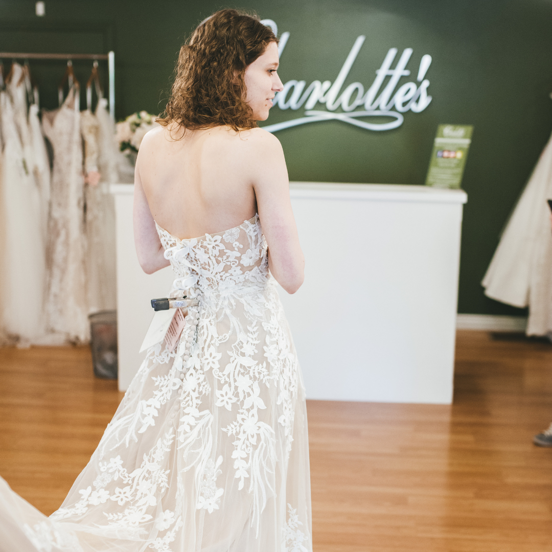 Why Your Stylist Clips The Wedding Dresses During Your Appointment Image
