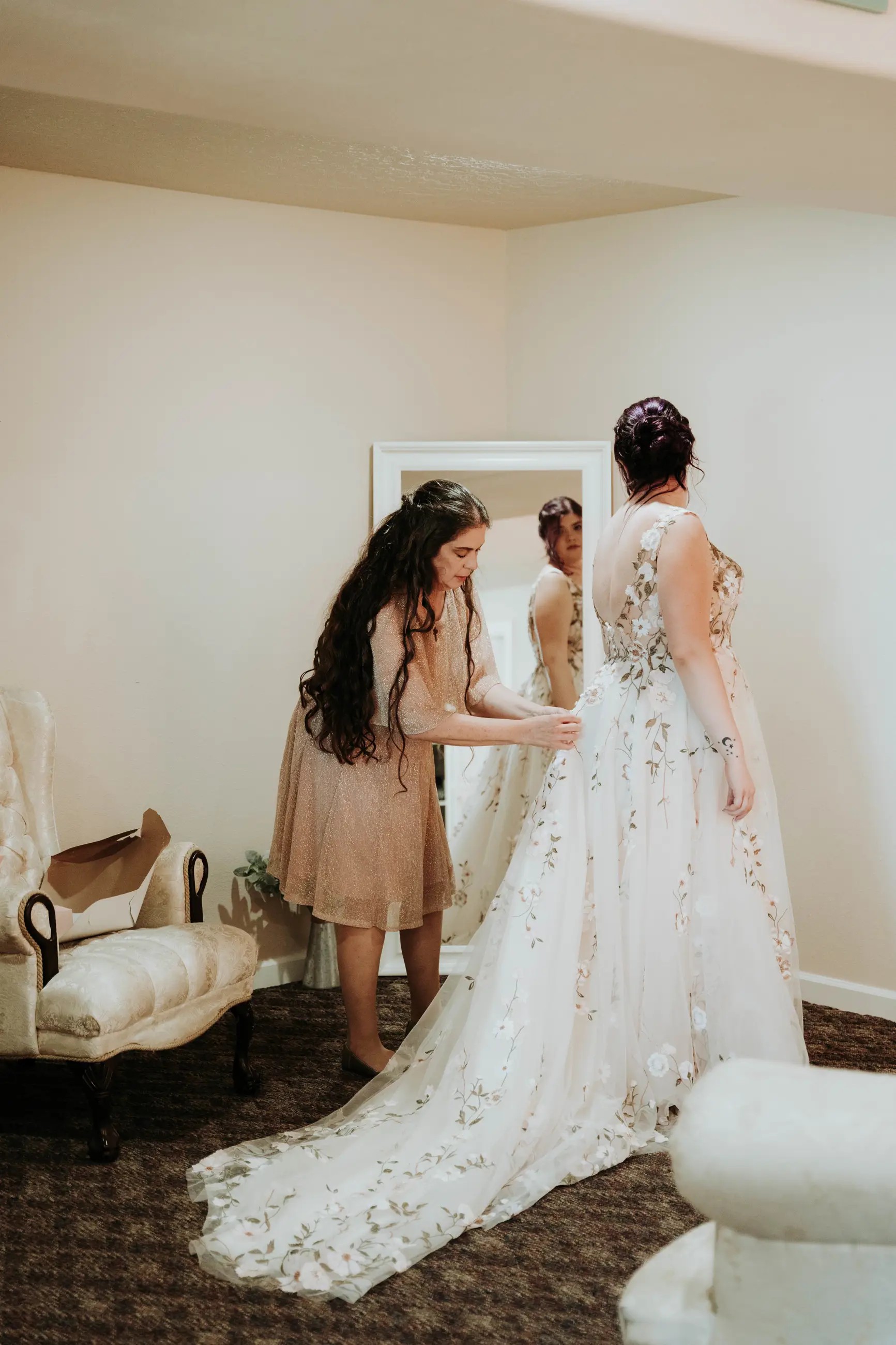 Bride getting ready for wedding, floral dress