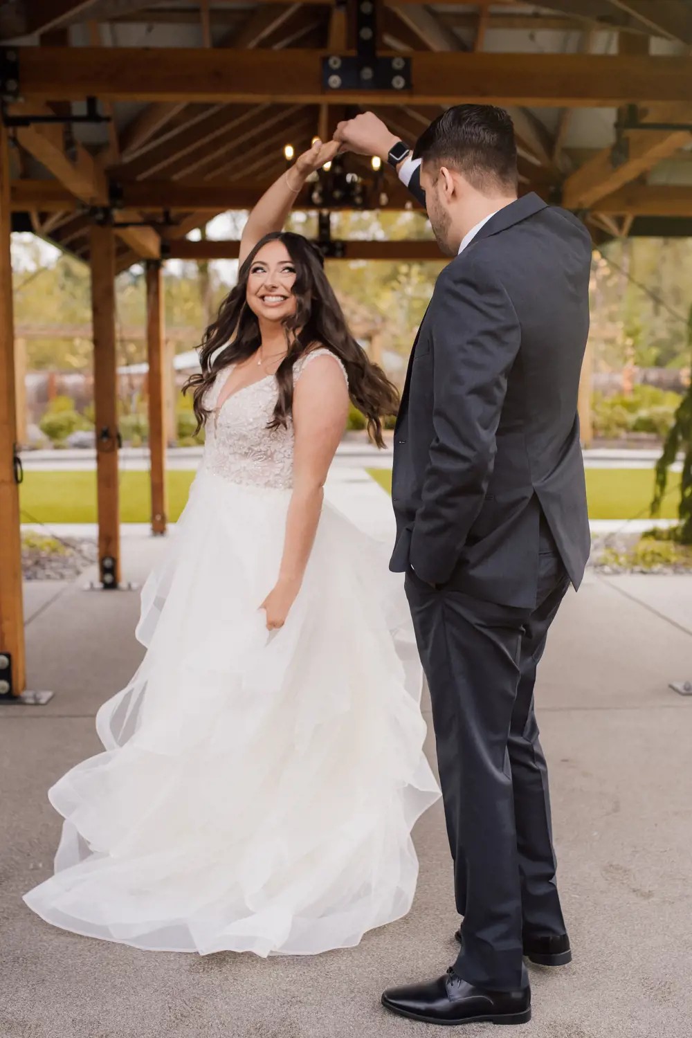 Bride in ballgown wedding dress twirl