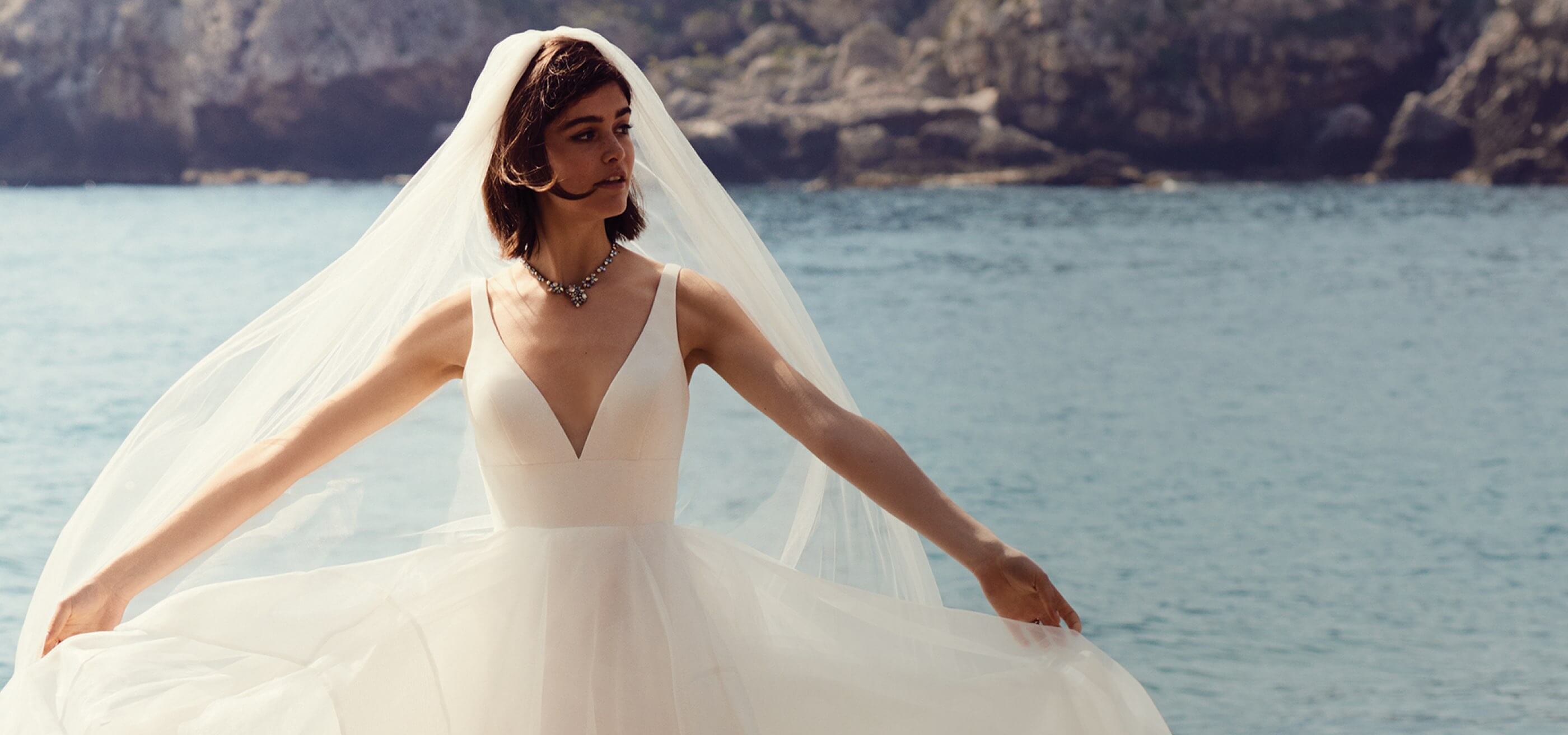 Bride on rocky seacoast