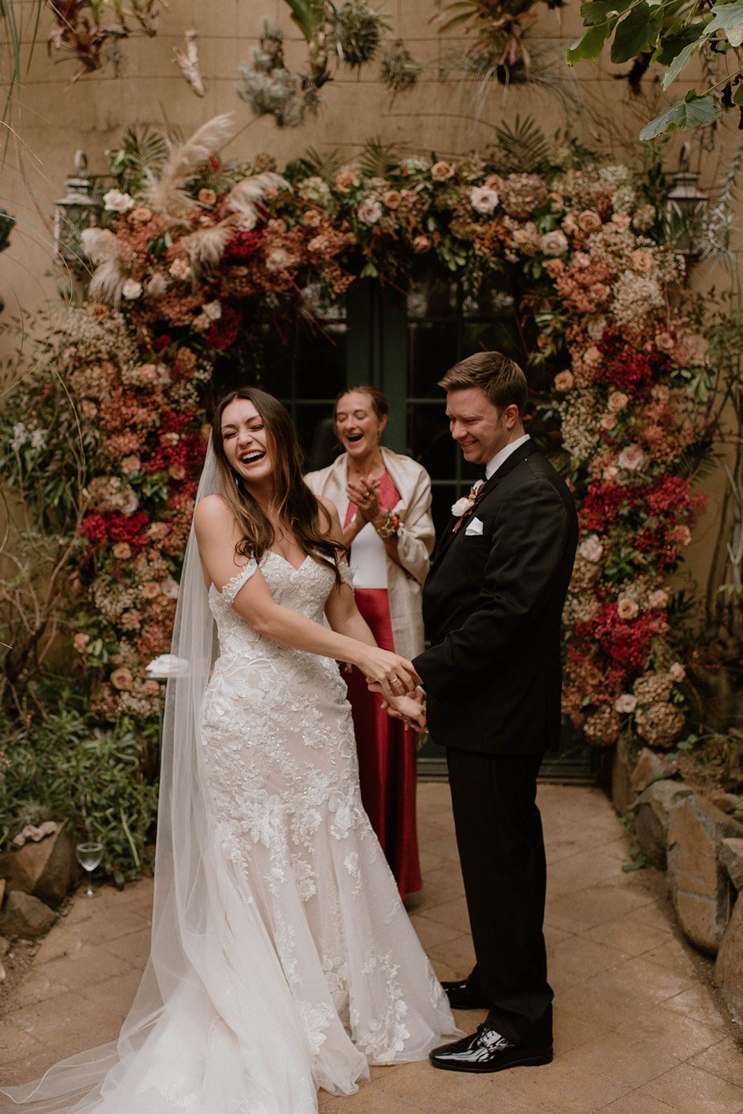 bride and groom at altar