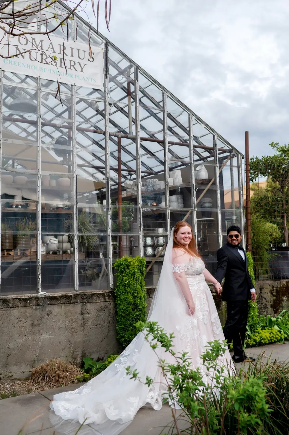 Bride and Groom Outside Pomarius Nursery in Portland, OR