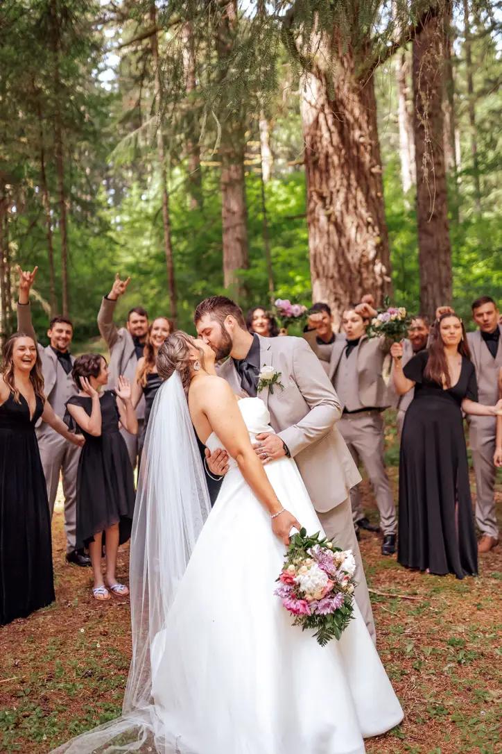Photo of couple at wedding in a forest
