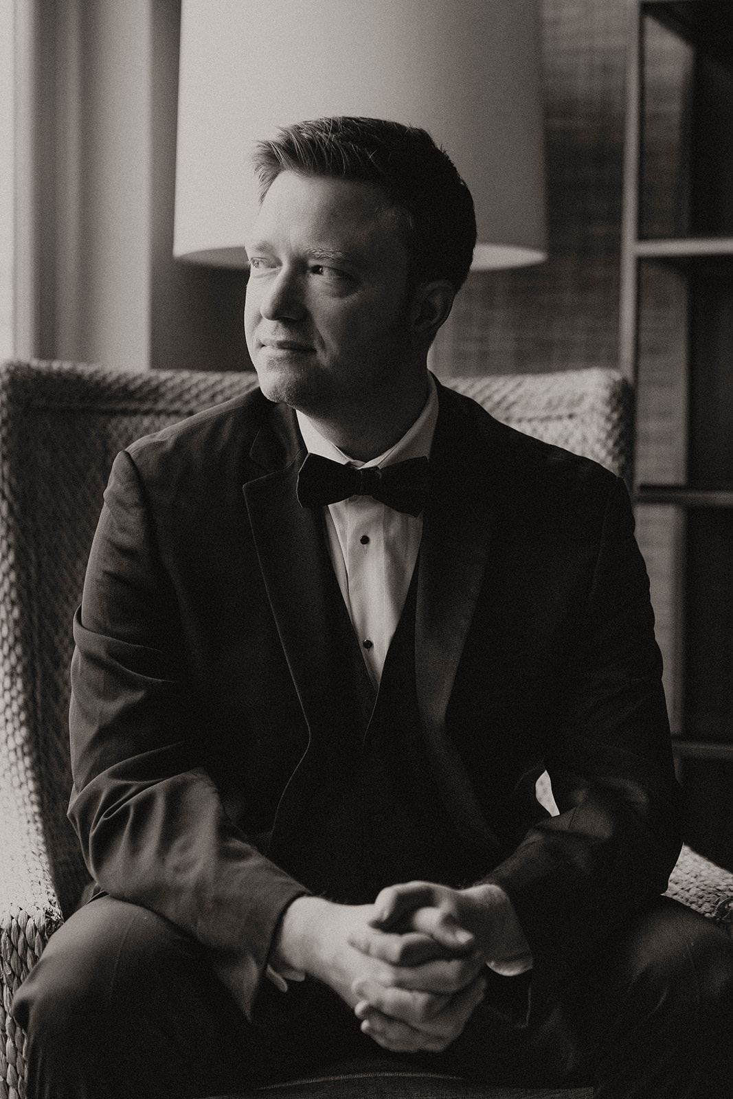 black and white groom portrait