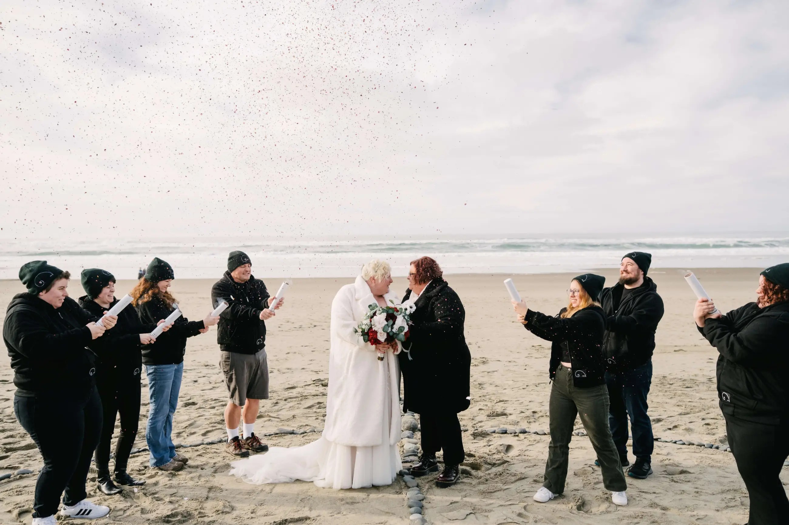 Photo of queer couple at wedding in Oregon