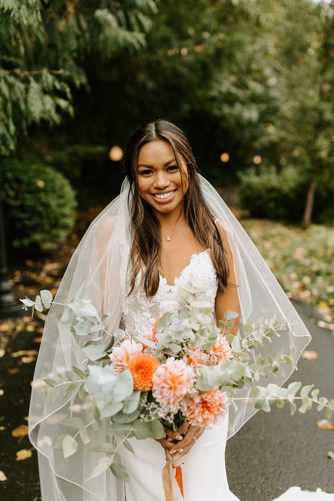 bride in wedding dress with veil from charlotte's weddings in portland oregon