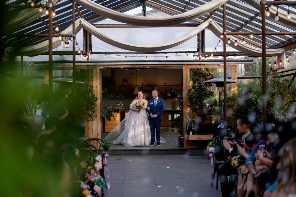 Bride Walking Down the Aisle at Pomarius Nursery