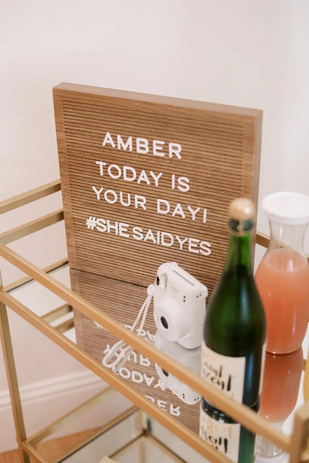 Letter board sign that says Amber Today is Your Day #shesaidyes