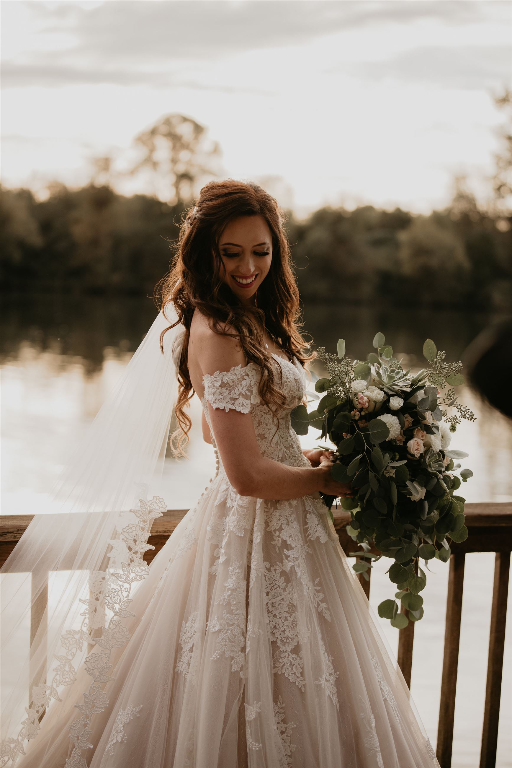 Bride in Justin Alexander "88122" ball gown from Charlotte's Weddings in Portland, OR