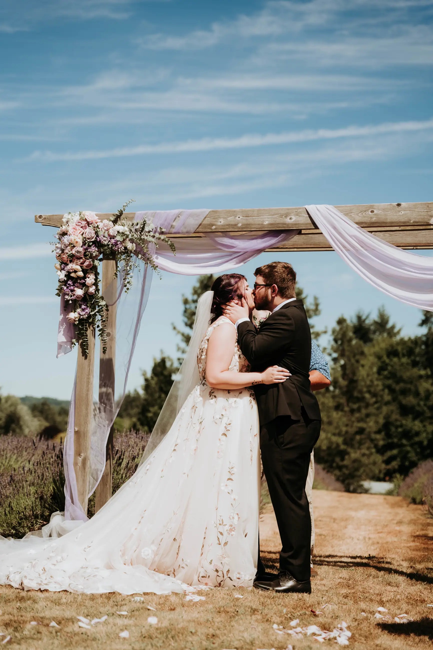 Bride and groom kissing on wedding day