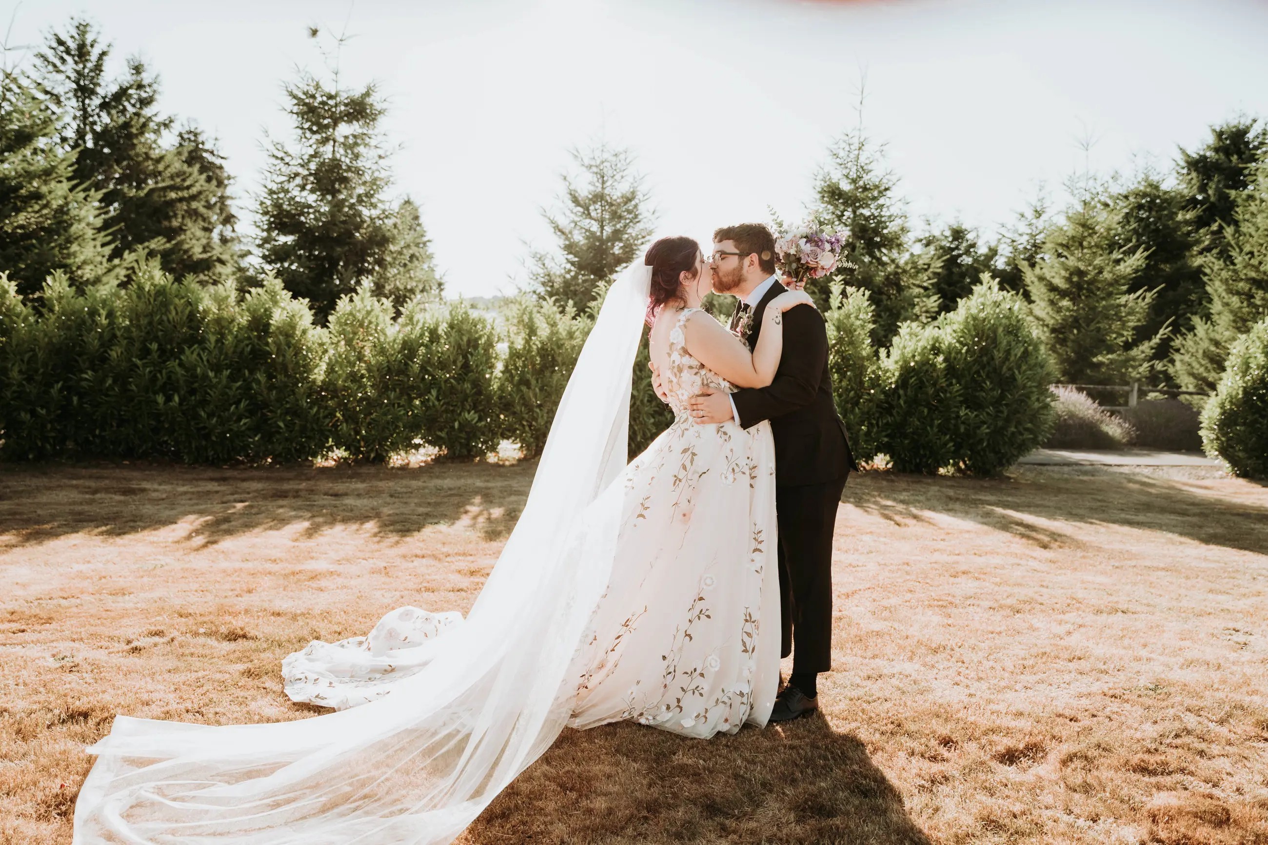 Bride and groom kissing