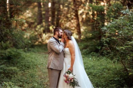 Bride and groom wedding ceremony in forest